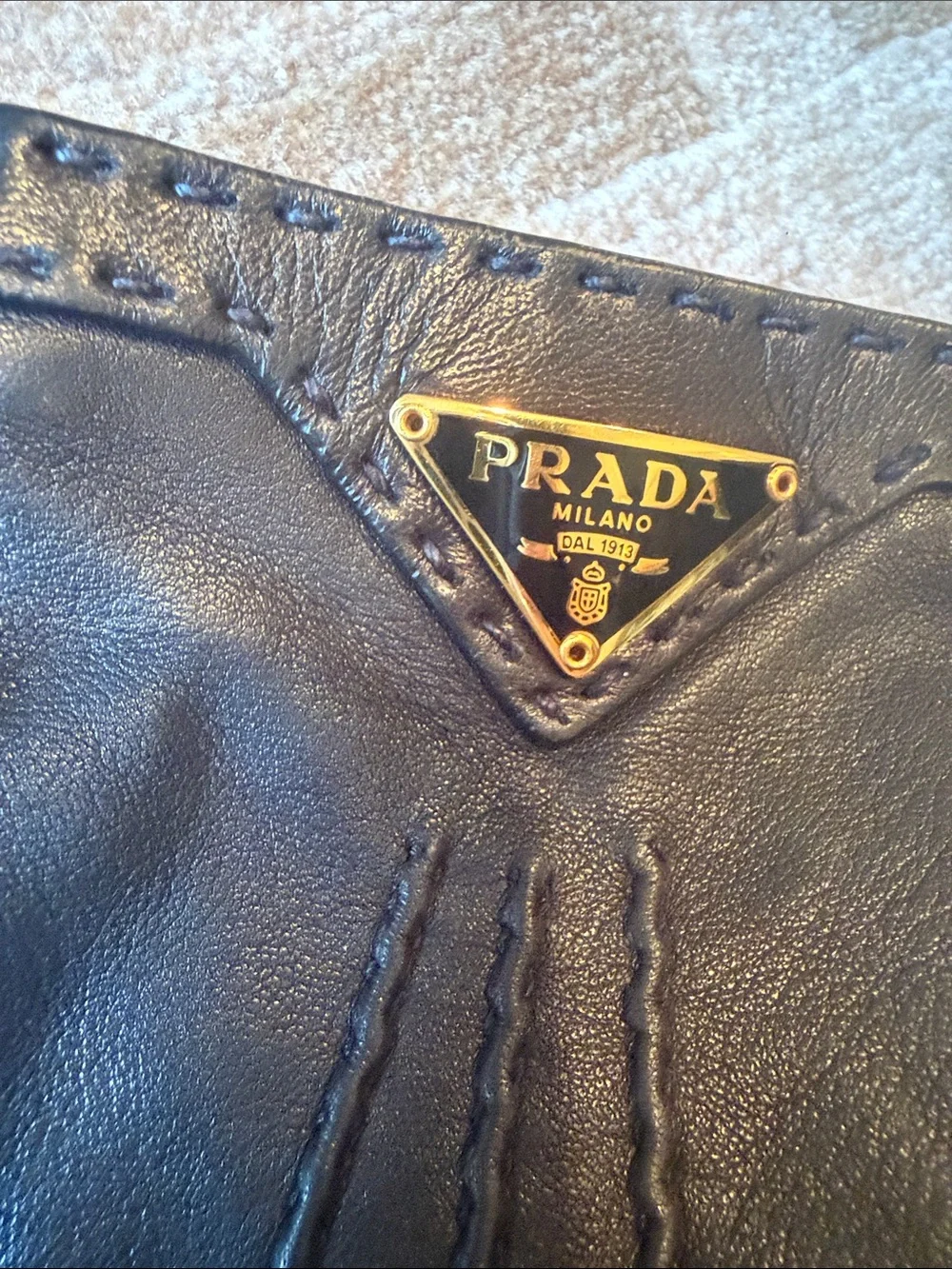 Prada Black Leather Gloves with Gold Triangle Logo